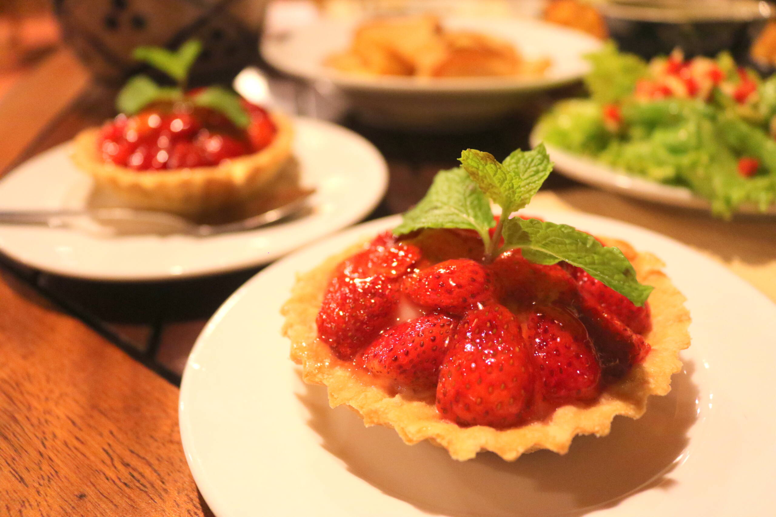 The strawberry tart at Whale Island Resort is a refined mix of sweet-tart elegance and a crispy crust.